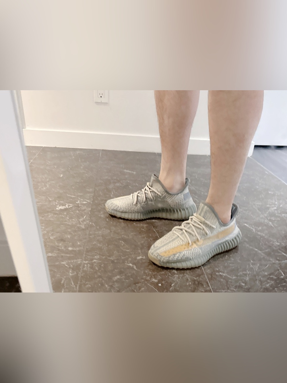 Yeezy Gray and Yellow Sneakers